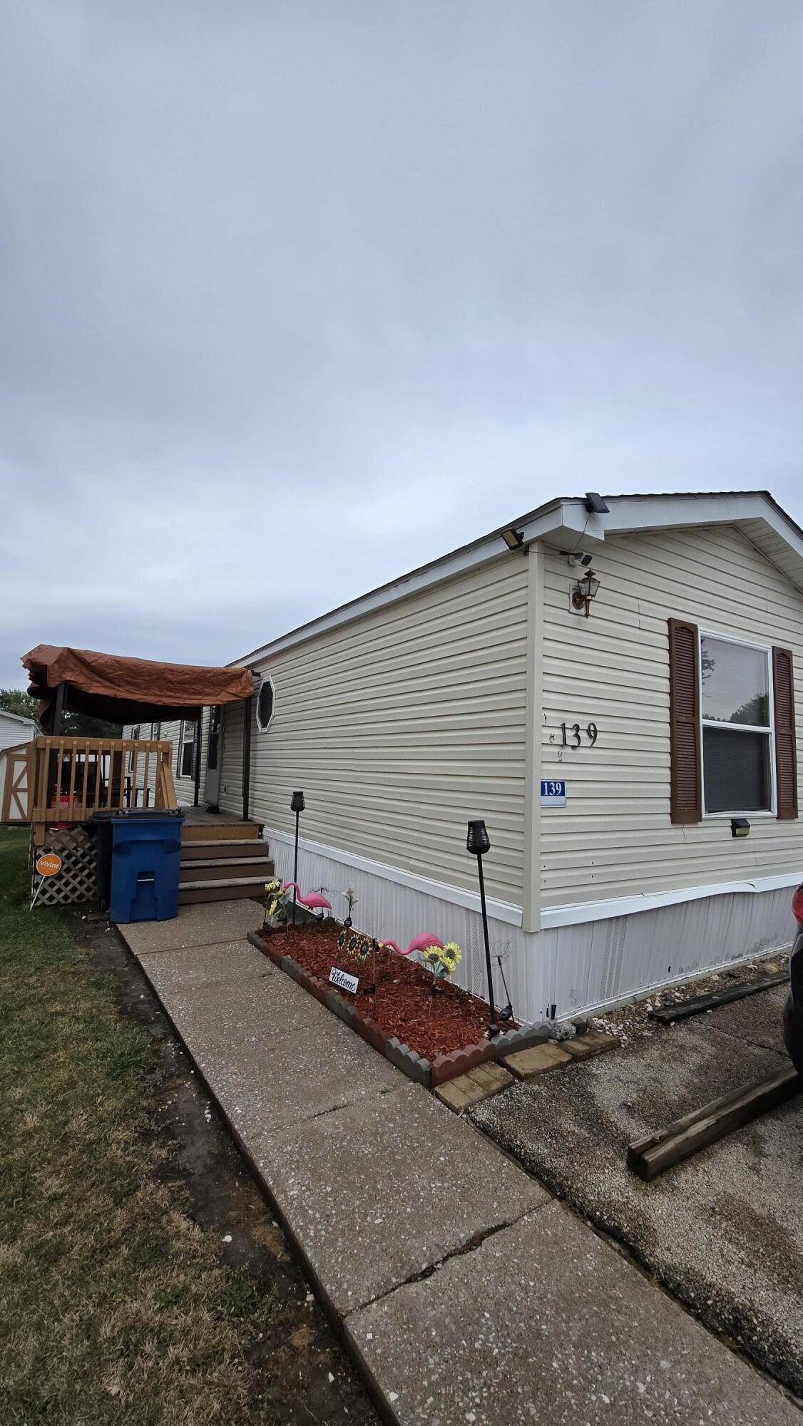 Photo 1 of 22 — 5112 N FAIRMOUNT LOT 139, Davenport, IA 52806