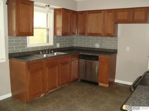 Photo of 4909 N 60th Street, Omaha, NE 68104 (MLS # 22531017) Photo of 4909 N 60th Street, Omaha, NE 68104 (MLS # 22531017)