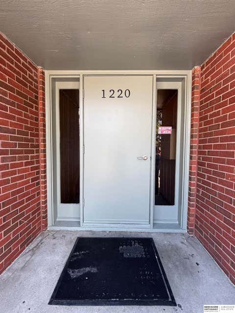 Photo of 1220 S 120th Plaza #302, Omaha, NE 68144 (MLS # 22618963)