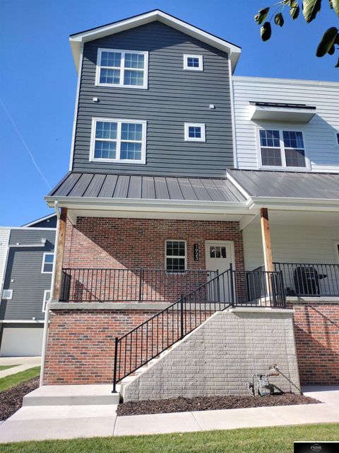 Photo of 1923 Dahlman Rows Plaza, Omaha, NE 68108 (MLS # 22613656)
