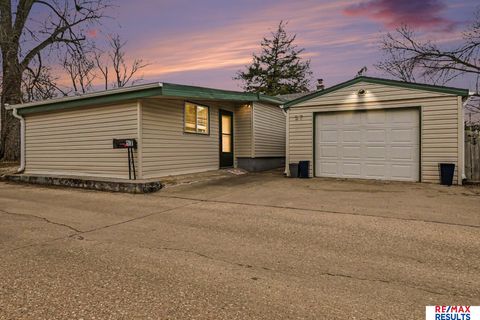 Photo of 57 Carter Lake Club, Council Bluffs, IA 51501 (MLS # 22608210)