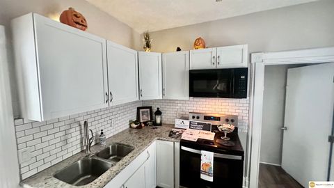 Photo of 2715 Pacific Street, Omaha, NE 68105 (MLS # 22529058) Photo of 2715 Pacific Street, Omaha, NE 68105 (MLS # 22529058)