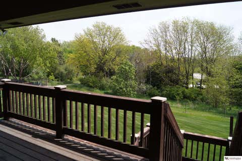 Photo of 16303 Woodland Drive, Omaha, NE 68136 (MLS # 22619265)