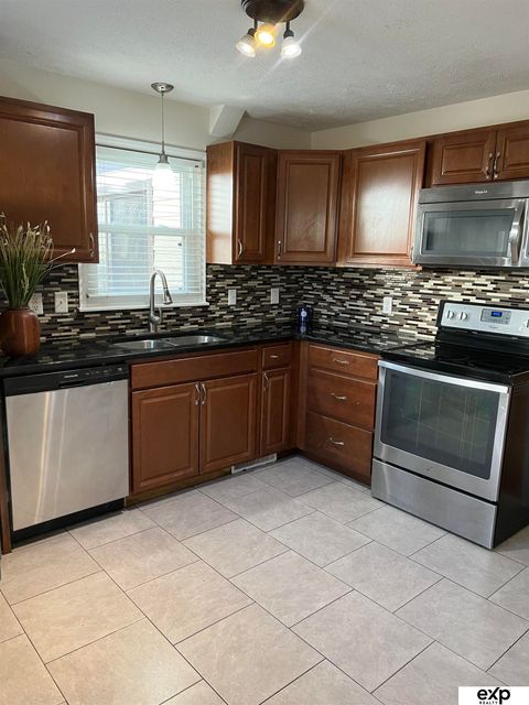 Photo of 1411 S 54 Street, Omaha, NE 68106 (MLS # 22535528)