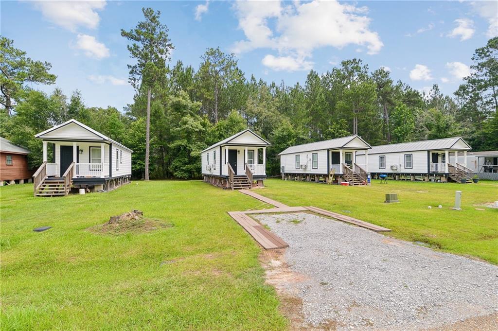 Photo 1 of 30 — 22323 DIXIE RUE Lane, Robert, LA 70455