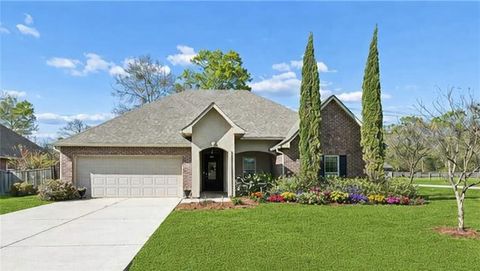 Photo of 983 WOODSPRINGS Court, Covington, LA 70433 (MLS # 2547806)