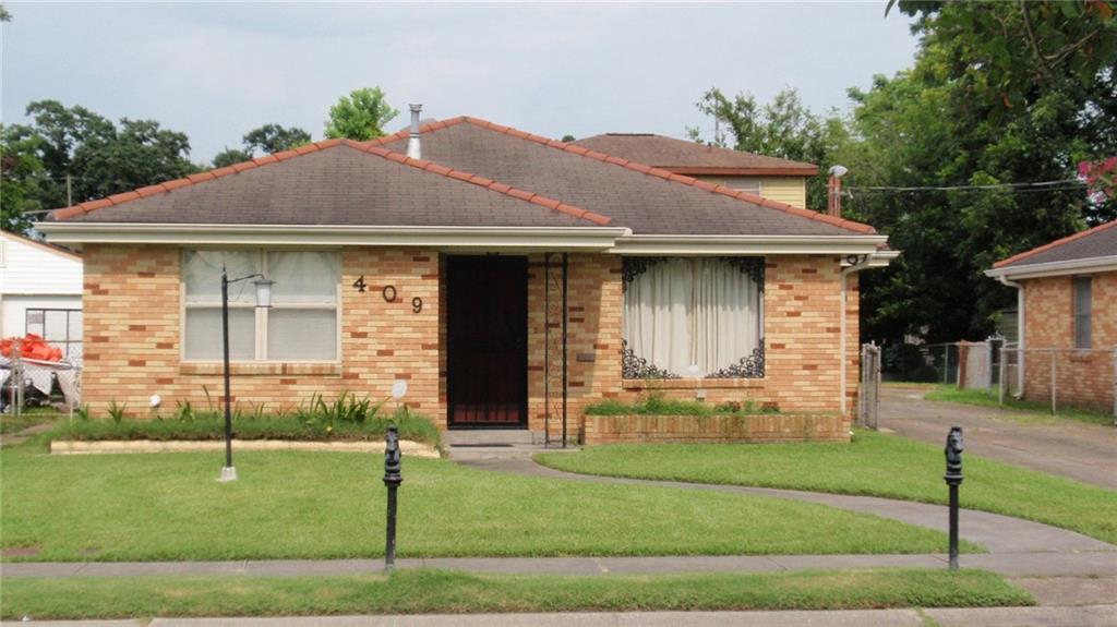 Photo 1 of 18 — 409 CARROLLTON Avenue, Metairie, LA 70005
