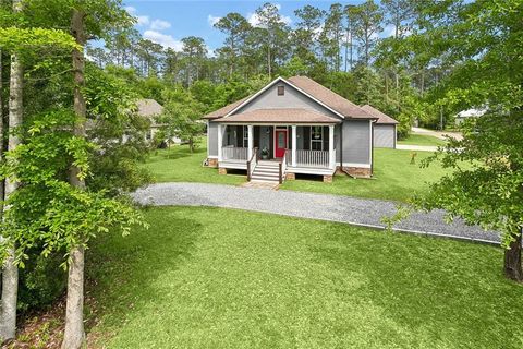 Photo of 71160 CAROLINE Street, Abita Springs, LA 70420 (MLS # 2555618)