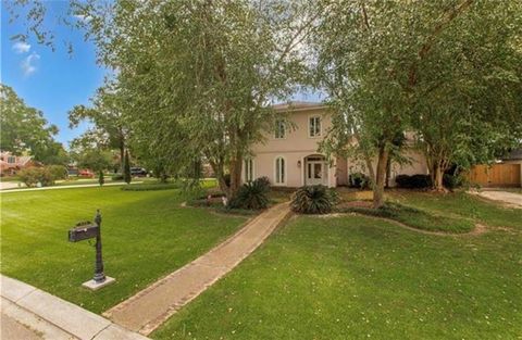 Photo of 615 RIVER OAKS Drive, Covington, LA 70433 (MLS # 2559582)