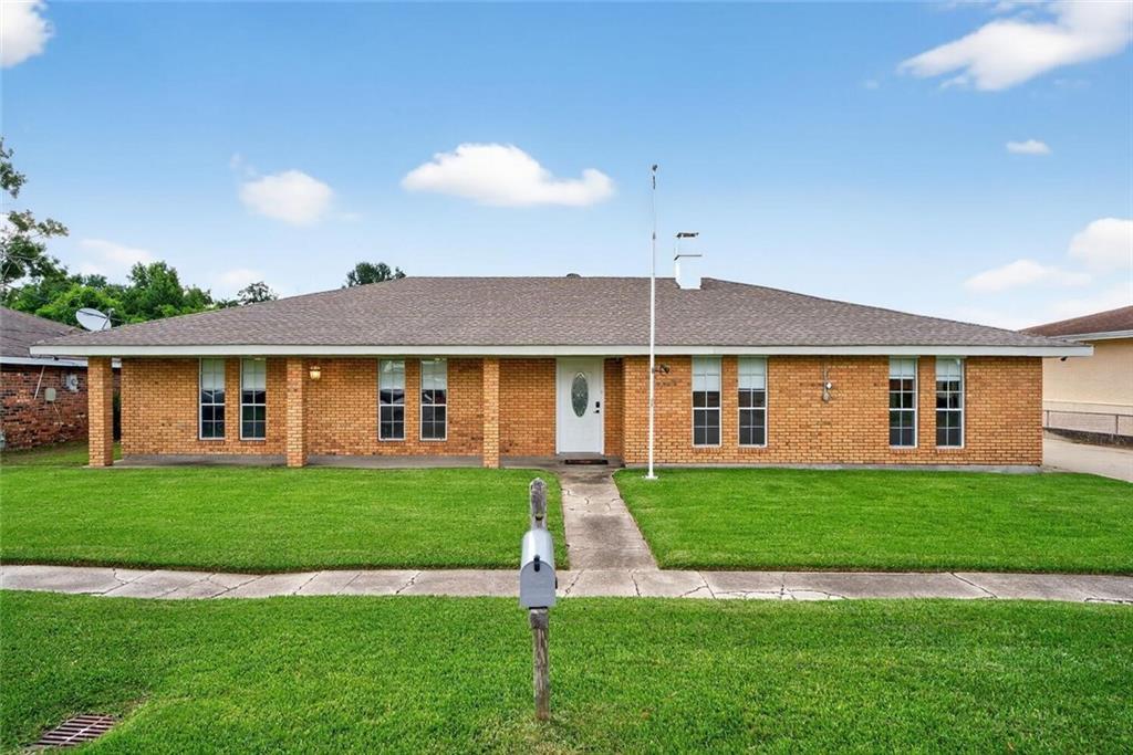 Photo 1 of 28 — 1305 ORCHID Drive, Harvey, LA 70058