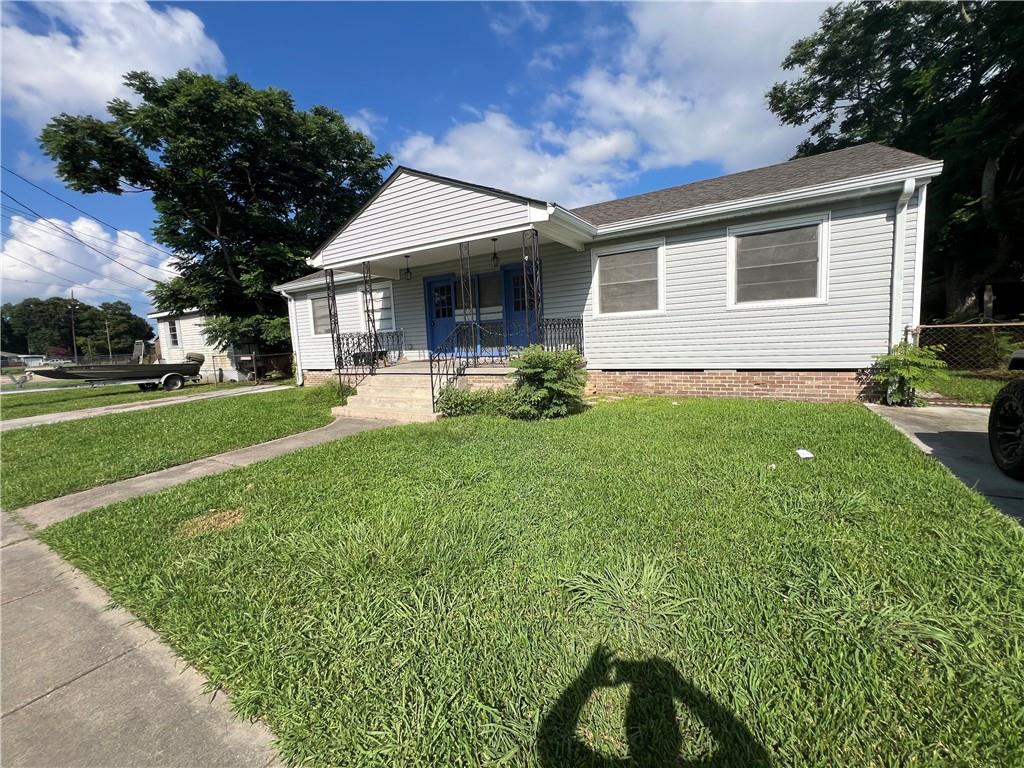Photo 1 of 16 — 713 COMMUNITY Street, Arabi, LA 70032