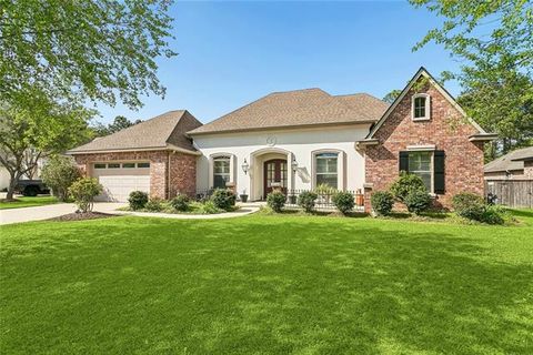 Photo of 751 Place Saint Etienne Drive, Covington, LA 70433 (MLS # NO2555989)
