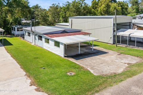 Photo of 1044 Jean Lafitte Street, Breaux Bridge, LA 70517 (MLS # 2500007018)