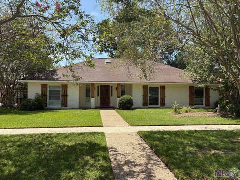 Photo of 2316 Laurelwood Dr Dr, Baton Rouge, LA 70816 (MLS # BR2026014733)