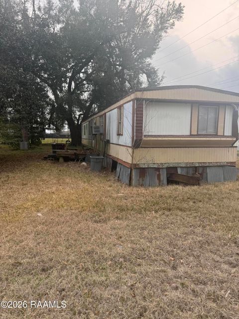 Photo of 507 Avenue B, Youngsville, LA 70592 (MLS # 2600002283)