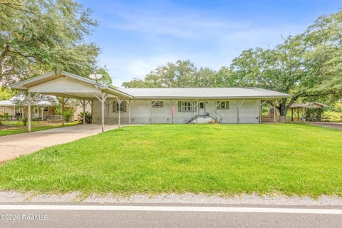 Photo of 1357 Herman Dupuis Road, Breaux Bridge, LA 70517 (MLS # 2600004880)