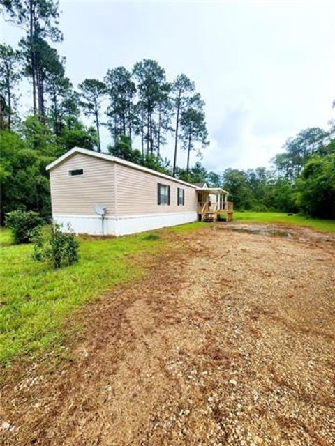 Photo of 73112 Putt Street, Abita Springs, LA 70420 (MLS # NO2569414)