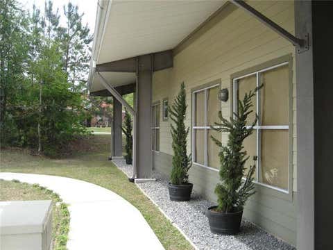 Photo of 109 Innwood Drive Dr #2, Covington, LA 70433 (MLS # NO2569996)