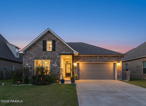 Photo of 303 Valcour Place, Youngsville, LA 70592 (MLS # 2600000093)