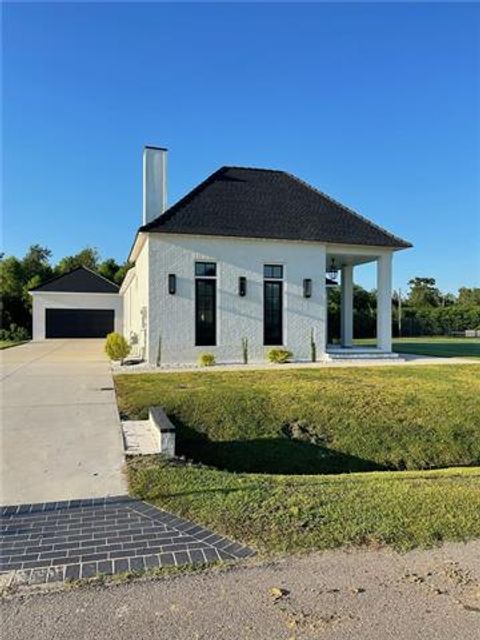 Photo of 106 Deerfield Drive DR, Belle Chasse, LA 70037 (MLS # NO2565106)