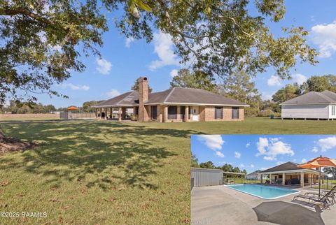 Photo of 1311 Orphe Guidry Road, Arnaudville, LA 70512 (MLS # 2500004583)