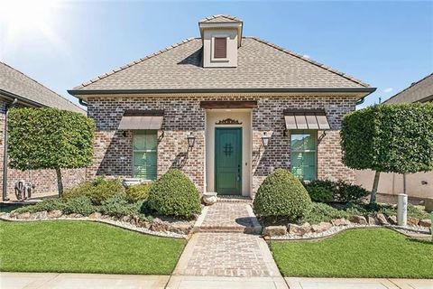 Photo of 525 Rue Jardins, Covington, LA 70433 (MLS # NO2547605)