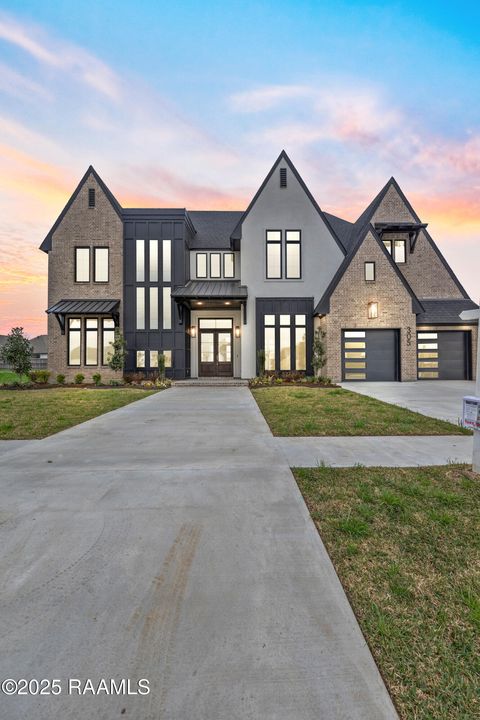 Photo of 305 Sunset Palm Court, Youngsville, LA 70592 (MLS # 2500003952)