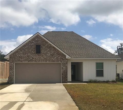 Photo of 212 Covington Cottage Lane Ln, Covington, LA 70433 (MLS # NO2556030)