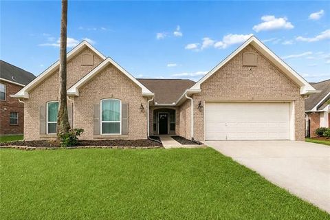 Photo of 128 Evangeline Trace, Belle Chasse, LA 70037 (MLS # NO2560007)