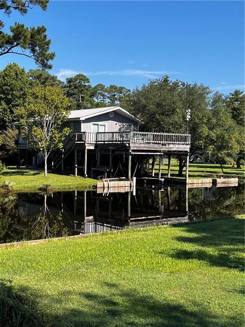 Photo of 59070 Muriel Lane Ln, Lacombe, LA 70445 (MLS # NO2539571)