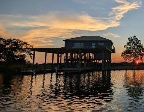 Photo of 64 Hopedale Canal, St. Bernard, LA 70085 (MLS # NO2541608)