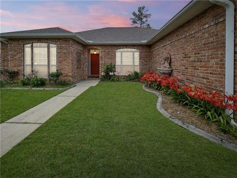 Photo of 407 E Redbud Drive Dr, Slidell, LA 70458 (MLS # NO2555963)