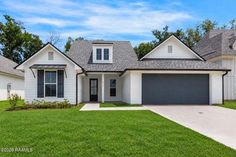 Photo of 611 Whispering Meadows Road, Broussard, LA 70518 (MLS # 2600009241)