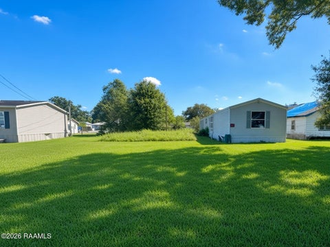 Photo of 704 Rimmer Avenue, Rayne, LA 70578 (MLS # 2600009688)