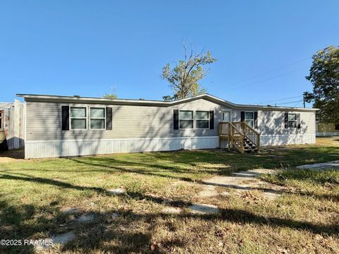 Photo of 125 La Rue Cannes, Duson, LA 70529 (MLS # 2500004772) Photo of 125 La Rue Cannes, Duson, LA 70529 (MLS # 2500004772)