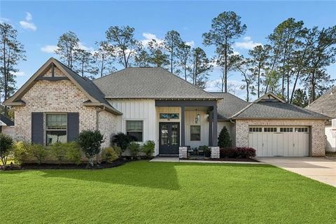 Photo of 452 Blue Heron Lane Ln, Madisonville, LA 70447 (MLS # NO2549153)