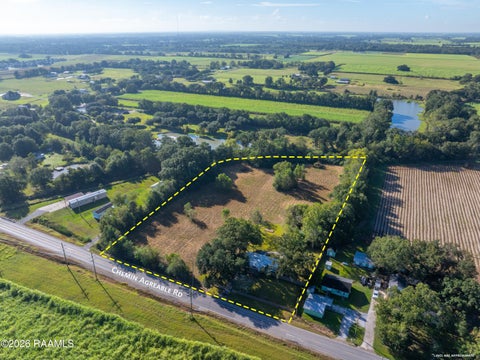 Photo of 821 Chemin Agreable Rd, Youngsville, LA 70592 (MLS # 2600009415)
