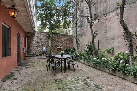 Photo of 411 Burgundy Street St #2, New Orleans, LA 70112 (MLS # NO2564662)