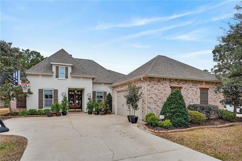 Photo of 1121 Cypress Crossing Drive Dr, Madisonville, LA 70447 (MLS # NO2566573)