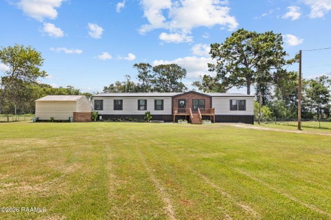 Photo of 206 Mcmillan Avenue, Iota, LA 70543 (MLS # 2600007870)
