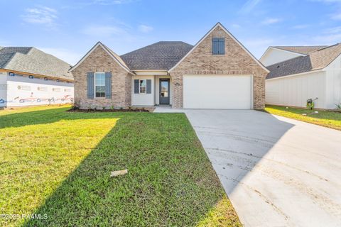 Photo of 309 Gun Runner Drive, Carencro, LA 70520 (MLS # 2500001267)