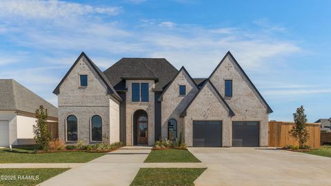 Photo of 309 Sunset Palm Court, Youngsville, LA 70592 (MLS # 2500005197)