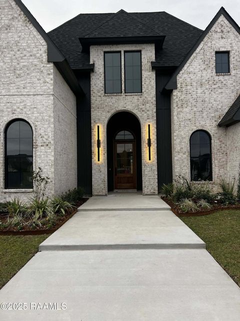 Photo of 309 Sunset Palm Court, Youngsville, LA 70592 (MLS # 2500005197)