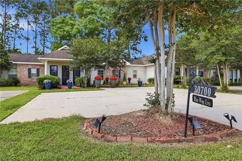 Photo of 30700 Blue Wing Crescent Cres, Springfield, LA 70462 (MLS # NO2555371)