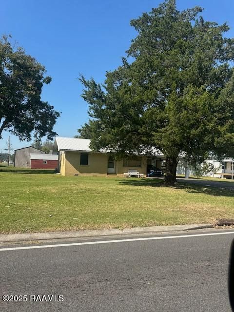 Photo of 1409 Grand Pointe Avenue, Breaux Bridge, LA 70517 (MLS # 2500004754)