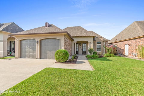 Photo of 104 Flora Springs Drive, Youngsville, LA 70592 (MLS # 2600007075)