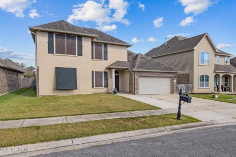 Photo of 106 Marais Avenue, Youngsville, LA 70592 (MLS # 2600008980)