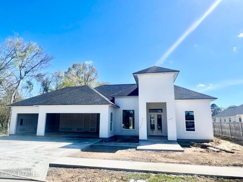 Photo of 106 Perdu Turn Lane, Youngsville, LA 70592 (MLS # 24010302) Photo of 106 Perdu Turn Lane, Youngsville, LA 70592 (MLS # 24010302)