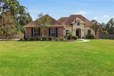 Photo of 408 Long Lake Drive Dr, Covington, LA 70435 (MLS # NO2572936)
