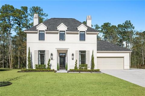 Photo of 5057 Twin River Place Pl, Covington, LA 70433 (MLS # NO2542263)